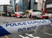Members of the police bomb squad cordon off an area where a World War Two bomb was found at a construction site in Hong Kong