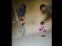 The man flogging his children.