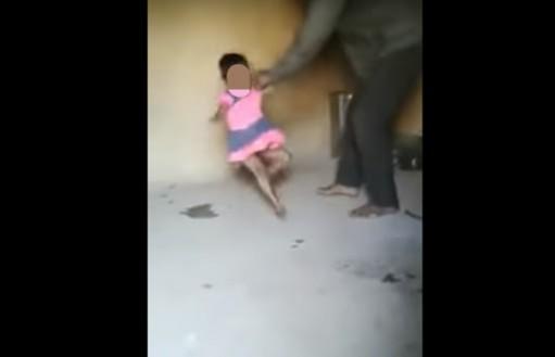 The man flogging his children. The man flogging his children.