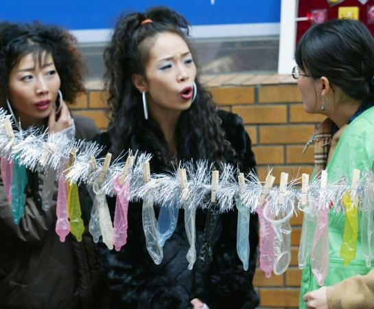 Condoms pegged to a string during an Aids awareness campaign in Seoul, South Korea condoms