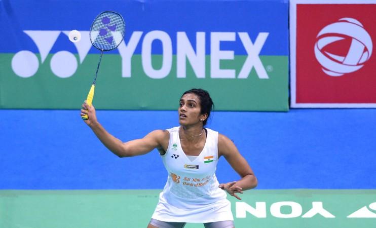 P.V. Sindhu plays a return against Thailand's Ratchanok Intanon during the women's singles semifinal in New Delhi on February 3, 2018. PV Sindhu