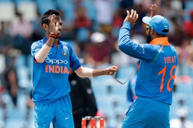 Yuzvendra Chahal celebrates a dismissal with captain Virat Kohli in Centurion on February 4. Yuzvendra Chahal and Virat Kohli