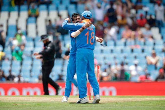 Yuzvendra Chahal (L) celebrates the dismissal South African batsman Chris Morris (not in picture) during the 2nd ODI at Centurion on February 4, 2018. Yuzvendra Chahal