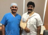 Nandamuri Balakrishna poses with a doctor at Continental Hospitals