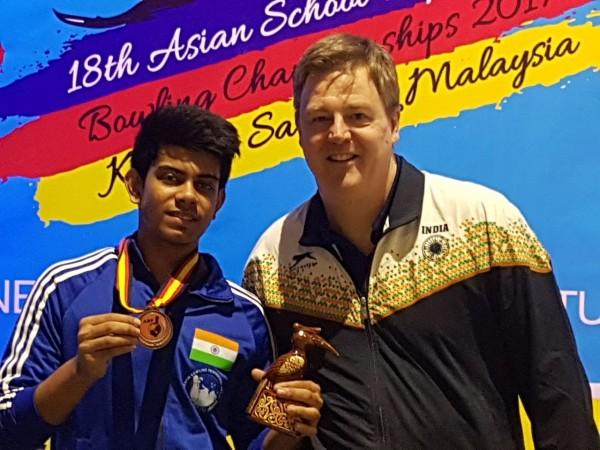 File photo: Shoumick Dutta (L) will participate in the week-long tournament in Bengaluru. Also seen is coach Andrew Frawley. Shoumick Datta