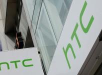 Logos of HTC are seen outside its store in Taipei, Taiwan