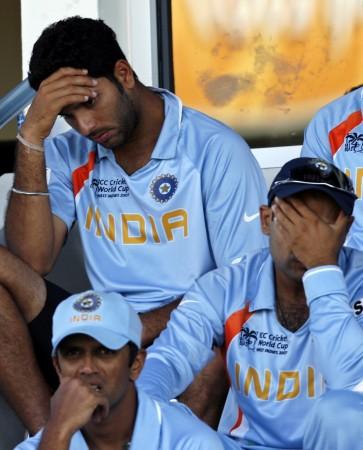 Captain Rahul Dravid, Virender Sehwag (right) and Yuvraj Singh (top-left) react after India lost the World Cup 2007 match against Sri Lanka in Port of Spain March 23, 2007. Rahul Dravid 2007 World Cup