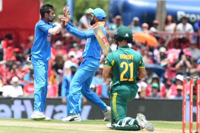 Yuzvendra Chahal of India celebrates the wicket of JP Duminywith Virat Kohli of India during the 2nd ODI. JP Duminy