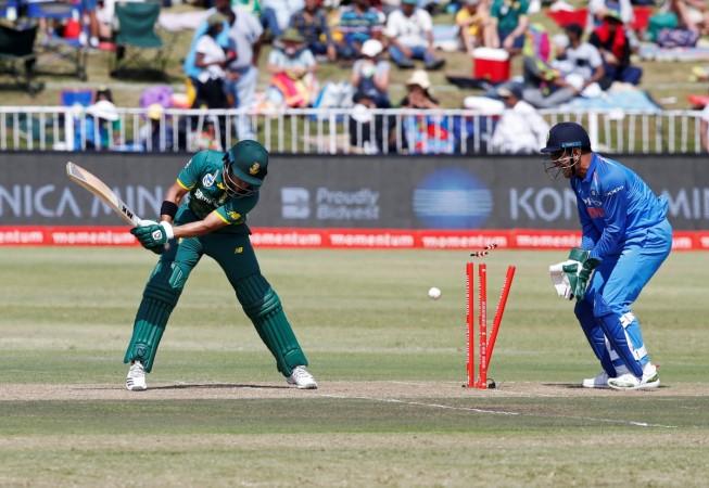 South Africa's JP Duminy is bowled as India's MS Dhoni looks on in the first ODI of the six-match series. South Africa vs India cricket
