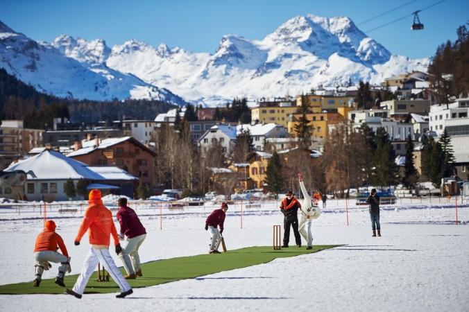 A game of cricket is under way on the frozen surface of the Lake St. Moritz ice cricket