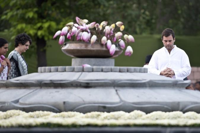 In picture: Rahul Gandhi pays respect to his father Rajiv Gandhi on his birth anniversary in New Delhi on August 20, 2015. His sister Priyanka Gandhi Vadra and her daughter are seen to the left. Rahul Gandhi, Miraya Gandhi, Priyanka Gandhi Vadra