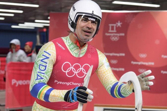 Shiva Keshavan of India reacts at the finishing line during a training session for the men's luge singles during the Pyeongchang 2018 Winter Olympic Games at the Olympic Sliding Centre in Pyeongchang on February 8, 2018 Shiva Keshavan