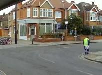 Ice block falls from the sky and narrowly misses passers-by
