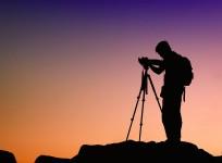 Photographer with his DSLR
