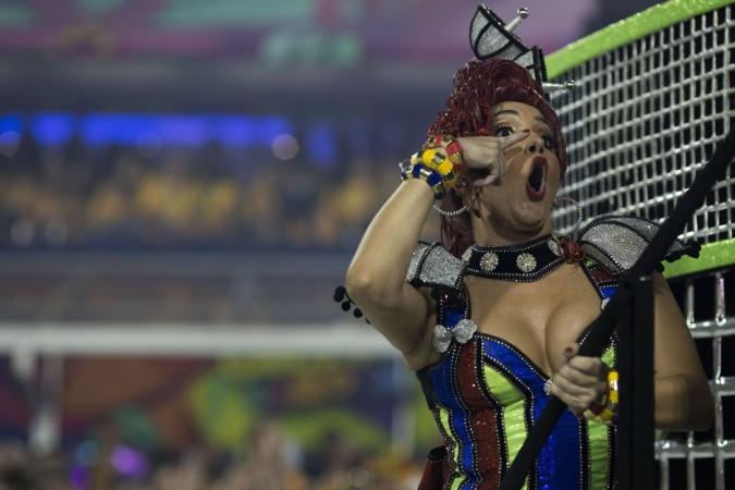 A reveller of the Grande Rio samba school performs during the first night of Rio's Carnival at the Sambadrome in Rio de Janeiro, Brazil, on February 12 rio carnival