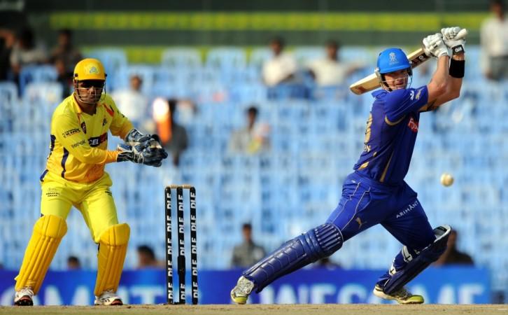 Shane Watson (R) is watched by Chennai Super Kings' MS Dhoni as he plays a shot during the IPL match between Chennai Super Kings and Rajasthan Royals in 2011. Shane Watson and MS Dhoni