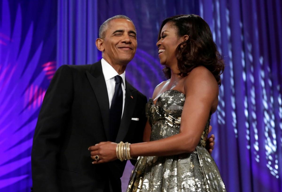 Barack Obama hugs Michelle Obama at the Congressional Black Caucus Foundation's 46th annual Legislative Conference Phoenix Awards Dinner in Washington, September 17, 2016. Barack and Michelle Obama