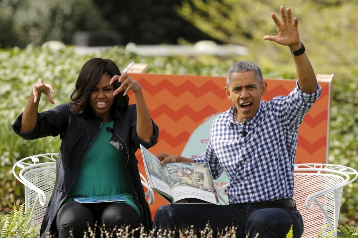 Michelle Obama and Barack Obama act out scenes from the children's book 'Where the Wild Things Are' as they preside over the annual Easter Egg Roll at the White House in Washington March 28, 2016. Barack and Michelle Obama