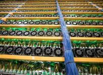 A wall of miners, seen at the cryptocurrency farming operation, Bitfarms