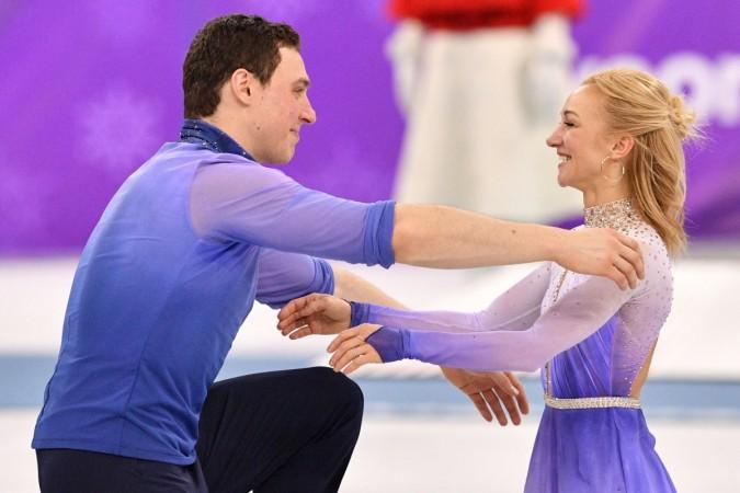 Gold medallists Germany's Aljona Savchenko and Germany's Bruno Massot celebrate during the venue ceremony after the pair skating free skating of the figure skating event during the Pyeongchang 2018 Winter Olympic Games at the Gangneung Ice Arena in Gangneung on February 15 aliona savchenko