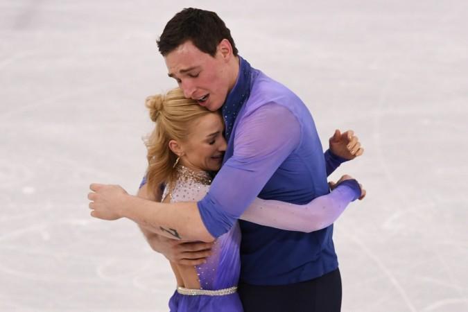Germany's Aljona Savchenko and Germany's Bruno Massot react after competing in the pair skating free skating of the figure skating event during the Pyeongchang 2018 Winter Olympic Games at the Gangneung Ice Arena in Gangneung on February 15 aliona savchenko