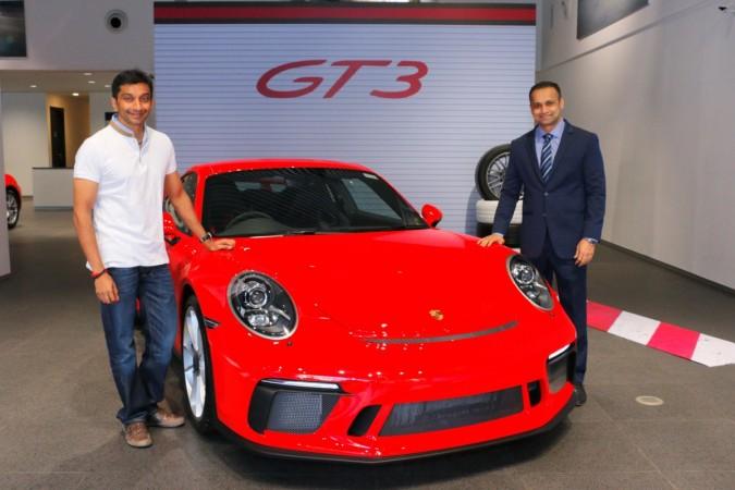 Narain Karthikeyan with Pavan Shetty, Porsche India director Porsche 911 GT3
