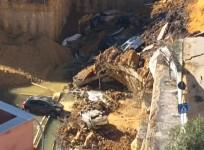 Giant sink hole swallows several cars in Rome