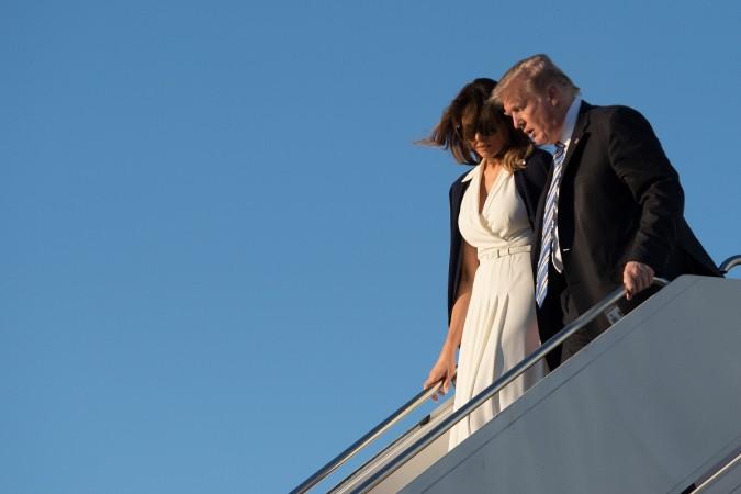 US President Donald Trump and First Lady Melania Trump arrive at Palm Beach International Airport in West Palm Beach, Florida, on February 16, 2018. Donald Trump and Melania Trump