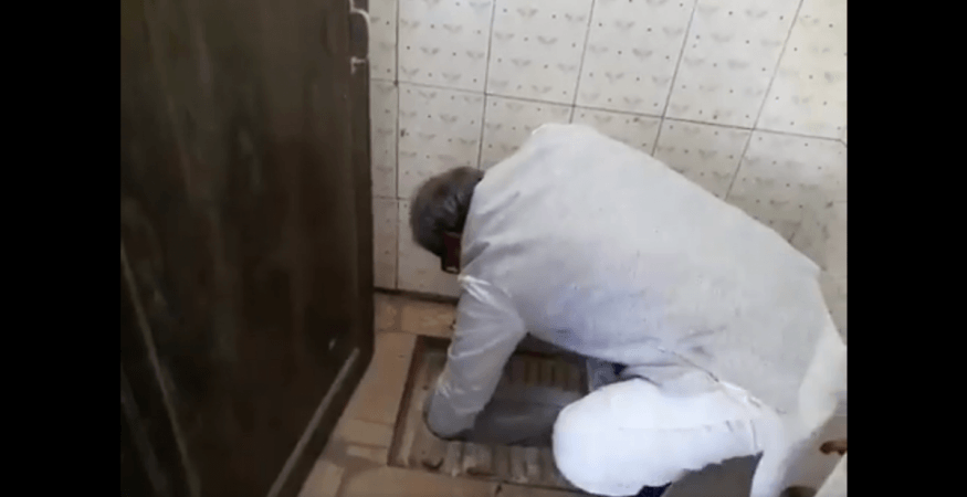 BJP MP from Madhya Pradesh Janardan Mishra unclogging a school's toilet BJP MP from Madhya Pradesh Janardan Mishra
