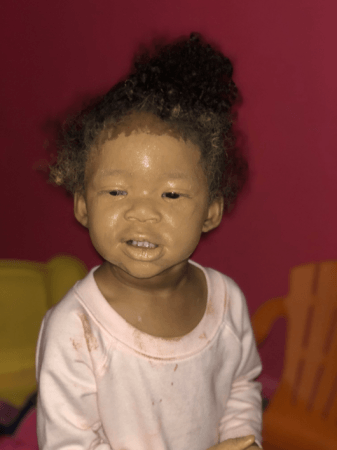 Photo tweeted by Katina Hawkins that shows her daughter Yani's face covered in a thick layer of foundation, with Twitter users complimenting her 'full coverage' look. Photo tweeted by Katina Hawkins that shows her daughter Yani's face covered in a thick layer of foundation, with Twitter users complimenting her 'full coverage' look.