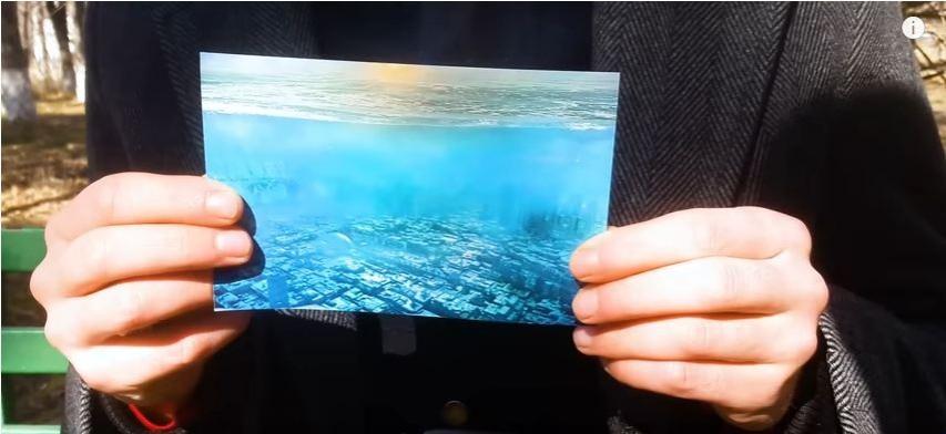 'Time Traveler' pulls out a photo from the jacket that he says was taken in the year 5000. Representational Image