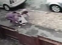 Horrific footage of 12-old-girl being mugged for her phone by man