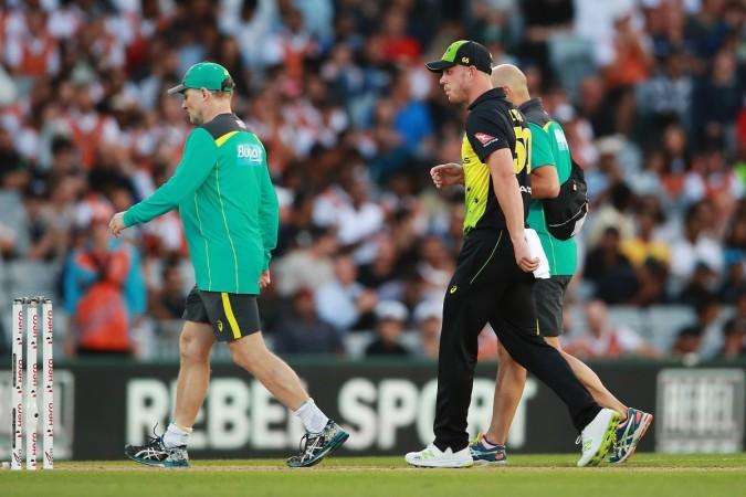 Chris Lynn of Australia walks off injured during the International Twenty20 Tri-Series Final match between New Zealand and Australia at Eden Park on February 21, 2018, in Auckland, New Zealand chris lynn