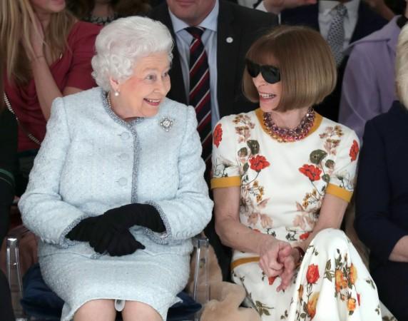 Queen and Anna Wintour enjoying the London Fashion Week. anna wintour and queen