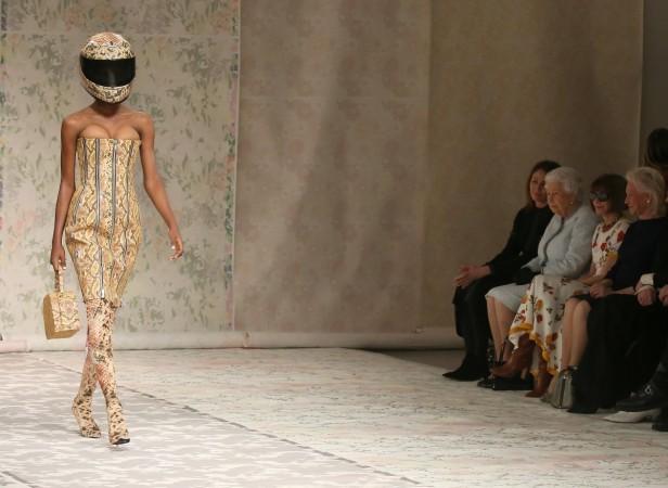 Queen Elizabeth II attends the Richard Quinn show. queen