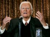 Evangelist Billy Graham speaks to members of the media at a news conference in New York, U.S. June 21, 2005.