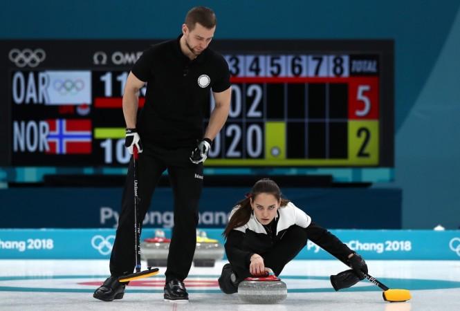 Anastasia Bryzgalova and Aleksandr Krushelnitckii of Olympic Athletes from Russia deliver a stone against Norway during the Curling Mixed Doubles Bronze Medal Game on day four of the PyeongChang 2018 Winter Olympic Games at Gangneung Curling Centre on February 13 Anastasia Bryzgalova