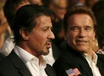U.S. actor Sylvester Stallone (L) and California Governor Arnold Schwarzenegger wait for the start of the WBC Heavyweight Championship boxing bout between Vitali Klitschko of Ukraine and Cristobal Arreola of the U.S