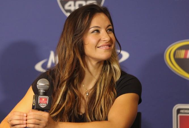UFC Women's Bantamweight Champion Miesha Tate addresses the media as the Grand Marshall for the NASCAR Sprint Cup Series FireKeepers Casino 400 at Michigan International Speedway on June 12, 2016 in Brooklyn, Michigan miesha tate, ufc