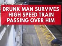 Watch this drunk man narrowly escaped death as train speeds past over his body