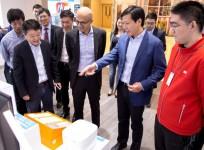Microsoft CEO Satya Nadella at the Xiaomi's retail store with Lei Jun-the founder, Chairman and CEO of Xiaomi, as well as Wang Xiang.