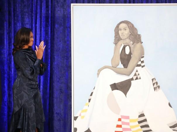 Former U.S. first lady Michelle Obama looks at her newly unveiled portrait during a ceremony at the Smithsonian's National Portrait Gallery Former U.S. first lady Michelle Obama looks at her newly unveiled portrait during a ceremony at the Smithsonian's National Portrait Gallery