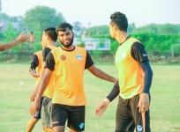 Minerva Punjab FC players train at their home stadium on Sunday -- the eve of their match against Aizawl