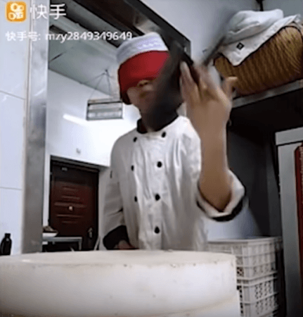 Mo Aiai is a 17-year-old chef from Beijing who has mastered the art of spinning knife while being blindfolded. Mo Aiai is a 17-year-old chef from Beijing who has mastered the art of spinning knife while being blindfolded.
