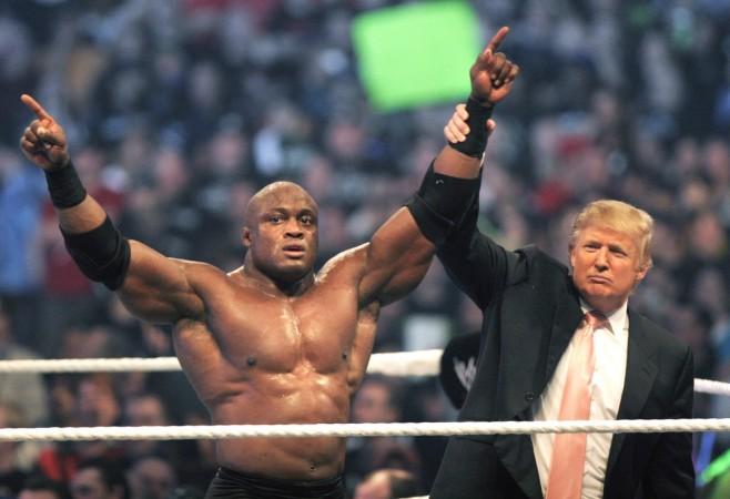 Donald Trump raises the hand of WWE wrestler Bobby Lashley in victory after Lashley defeated Umaga in the Battle of the Billionaires at the 2007 World Wrestling Entertainment's Wrestlemania April 1, 2007 at Ford Field in Detroit, Michigan wwe, donald trump, bobby lashley