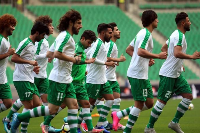 Iraqi national football team players take part in a training session on February 27, 2018 in the city of Basra a day ahead of their friendly match against Saudi Arabia