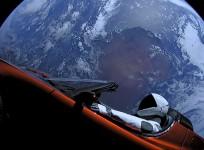 A cherry red Tesla Roadster automobile floats through space after it was carried there by SpaceX's Falcon Heavy in this image obtained by Reuters on February 9, 2018.