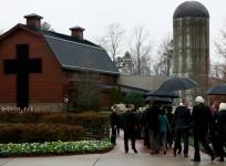 The casket containing the late U.S. evangelist Billy Graham is received by his family and others at the Billy Graham Library in Charlotte, North Carolina, U.S. March 1, 2018.
