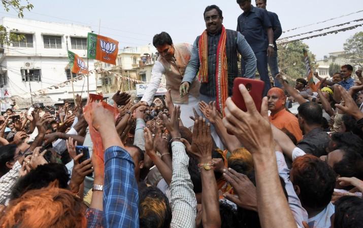 Tripura BJP president Biplab Kumar Deb along with the party's National General Secretary Ram Madhav greet party workers as they celebrate the party's performance in the recently concluded Tripura assembly elections, in Agartala on March 3, 2018. Tripura BJP president Biplab Kumar Deb along with the party's National General Secretary Ram Madhav greet party workers as they celebrate the party's performance in the recently concluded Tripura assembly elections, in Agartala on March 3, 2018.
