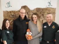 Woman with severe stomach pain gives birth not realizing shes pregnant